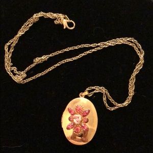Vintage gold tone locket pink